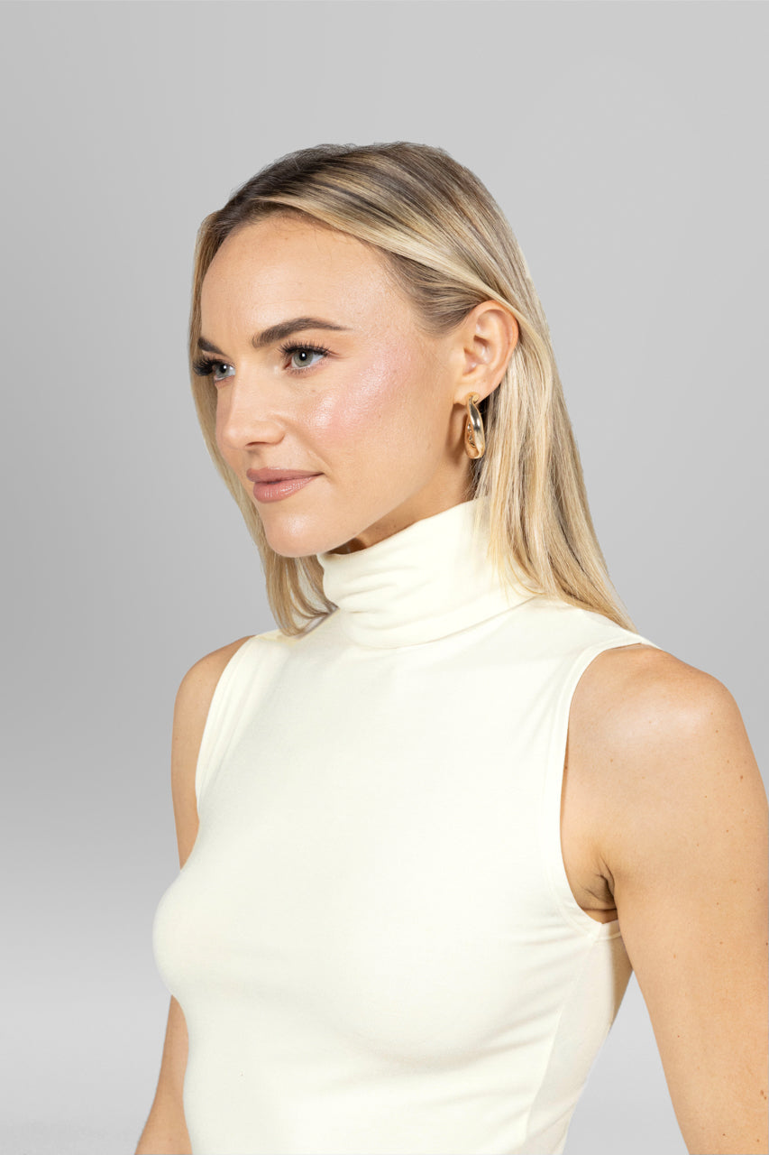 KiraGrace SLEEVELESS TURTLENECK: IVORY