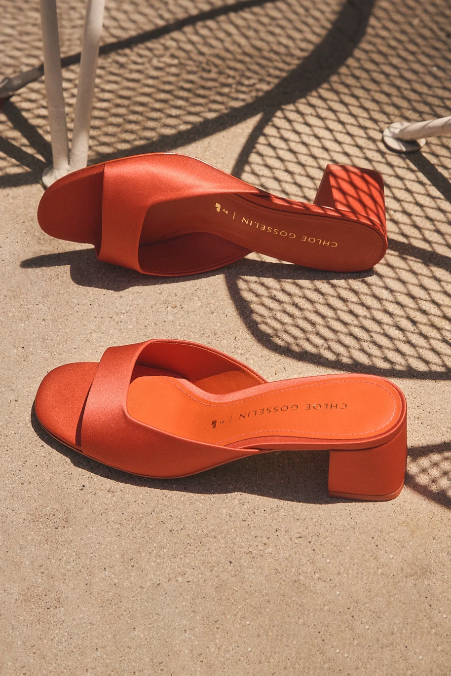 Chloe Gosselin By Larroudé Anah Mule In Orange Sunrise Satin