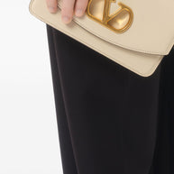 Valentino Garavani VLogo Signature Detail Vain Small Leather Clutch Bag - White