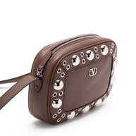 Valentino Garavani Nellcôte Eyelet-embellished Cross Body Bag