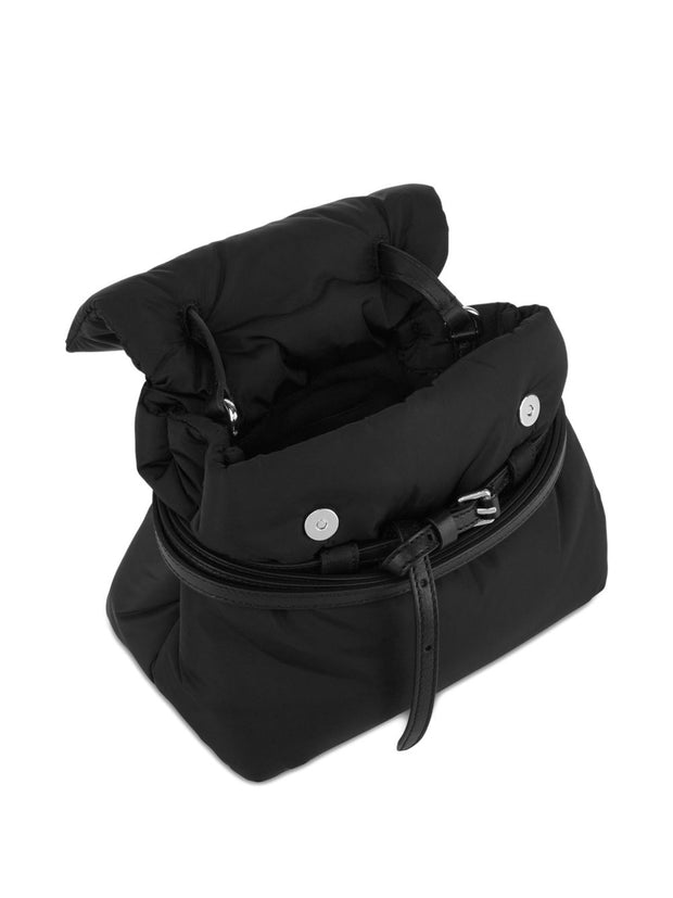 Black backpack with a zipper on a white background