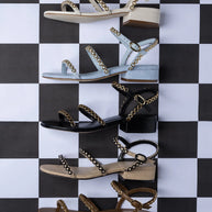Larroude Milanina Flat Sandal In Black Leather
