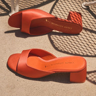 Chloe Gosselin By Larroudé Anah Mule In Orange Sunrise Satin