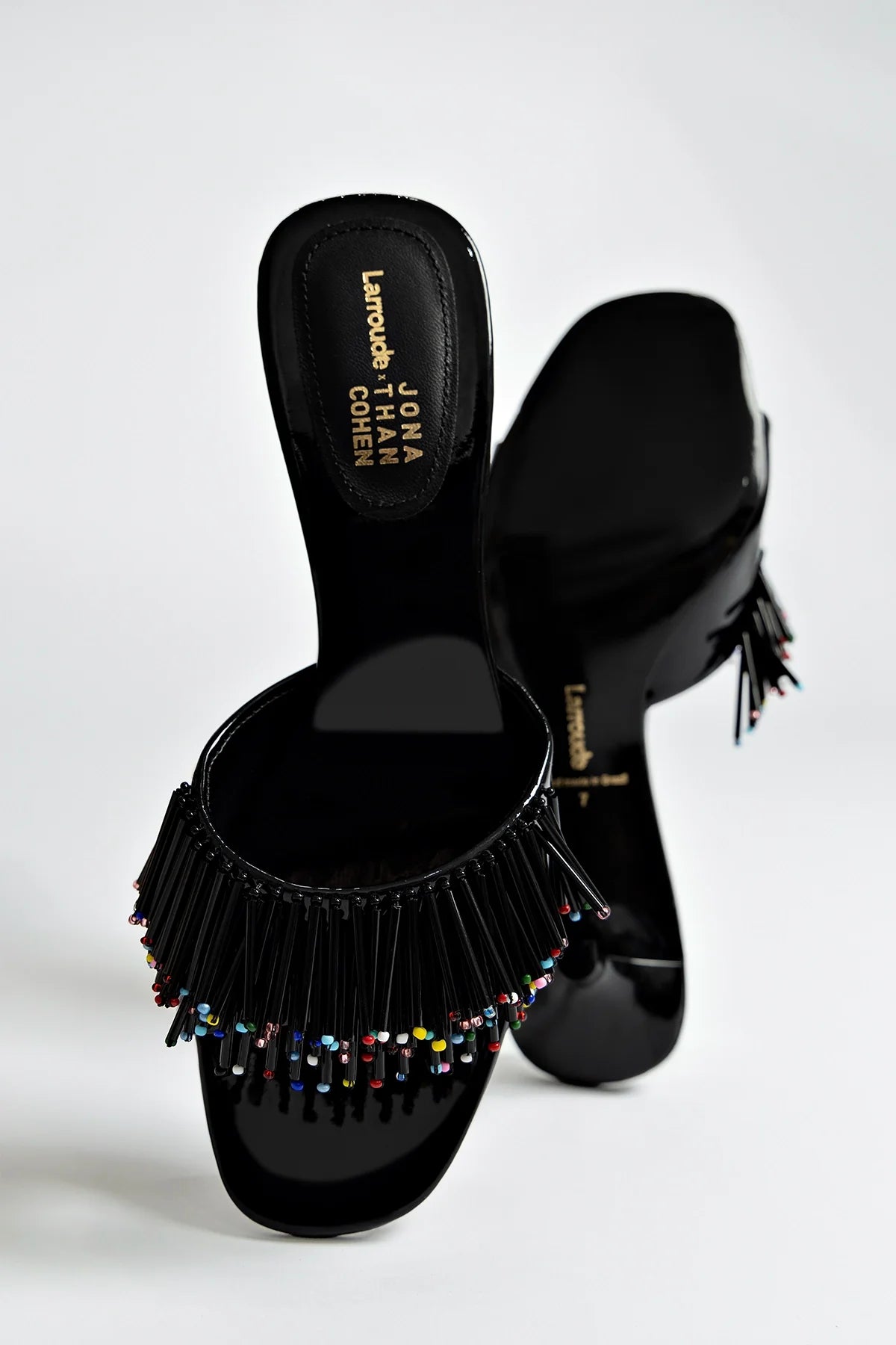 Larroudé X Jonathan Cohen Fringe Greta Mule In Black Patent Leather