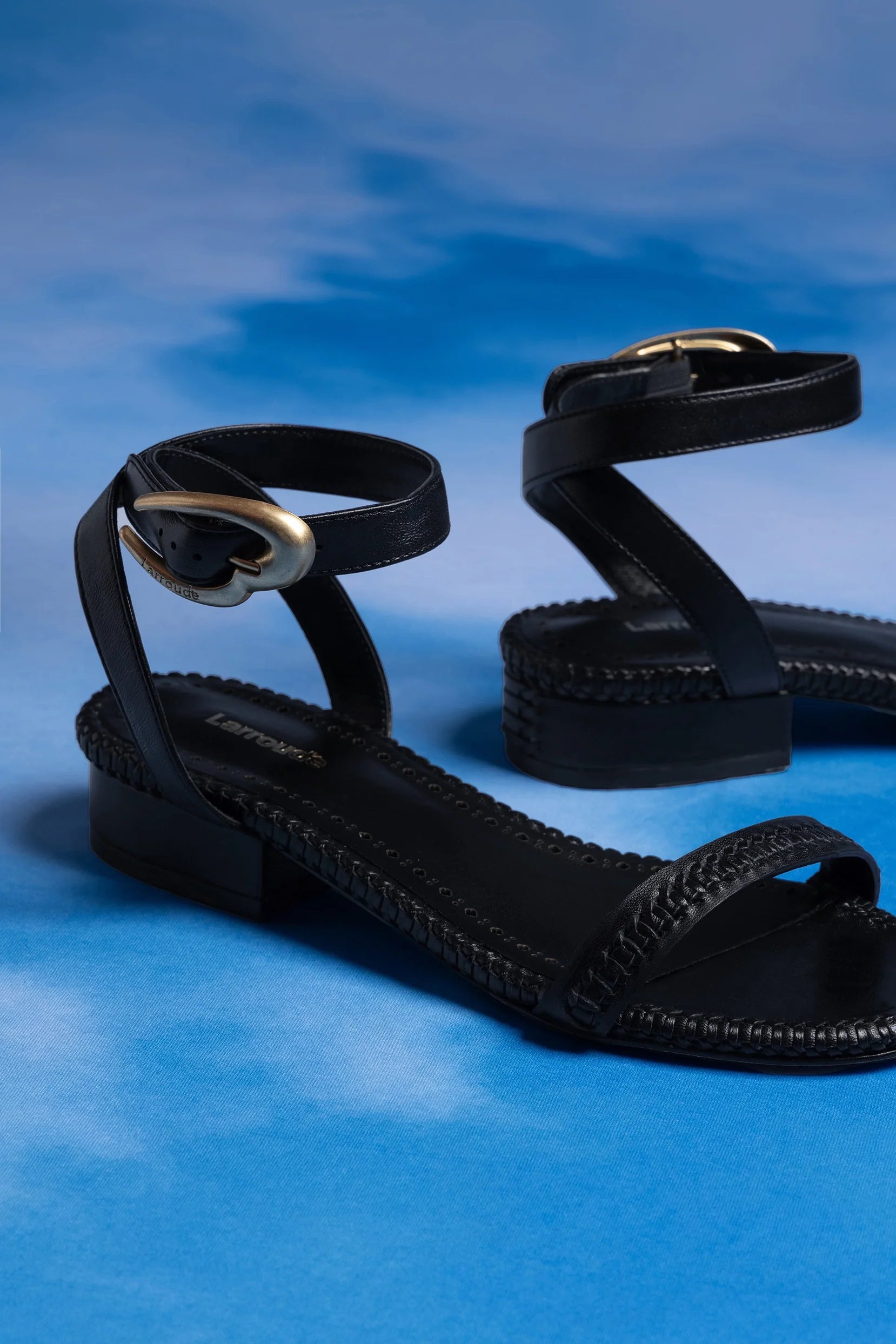 Larroude Verona Flat Sandal In Black Leather