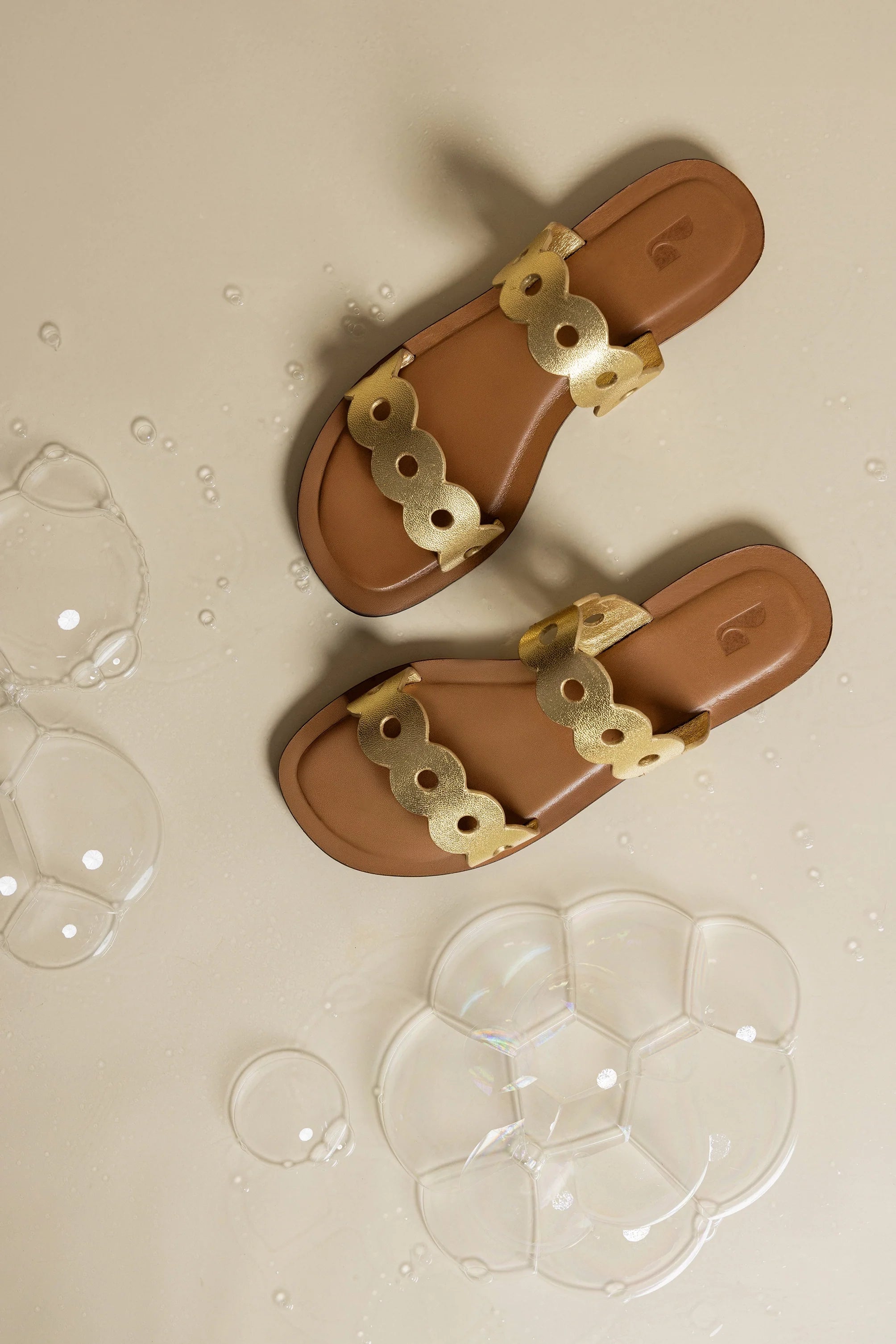 Larroude Florence Flat Mule In Gold Metallic Leather