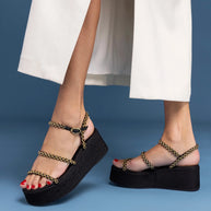 Larroude Gio Milanina Flatform Sandal In Black Raffia