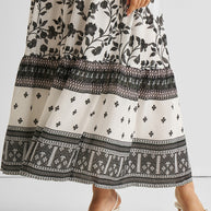 Reistor Strappy Tiered Maxi Dress in Florals