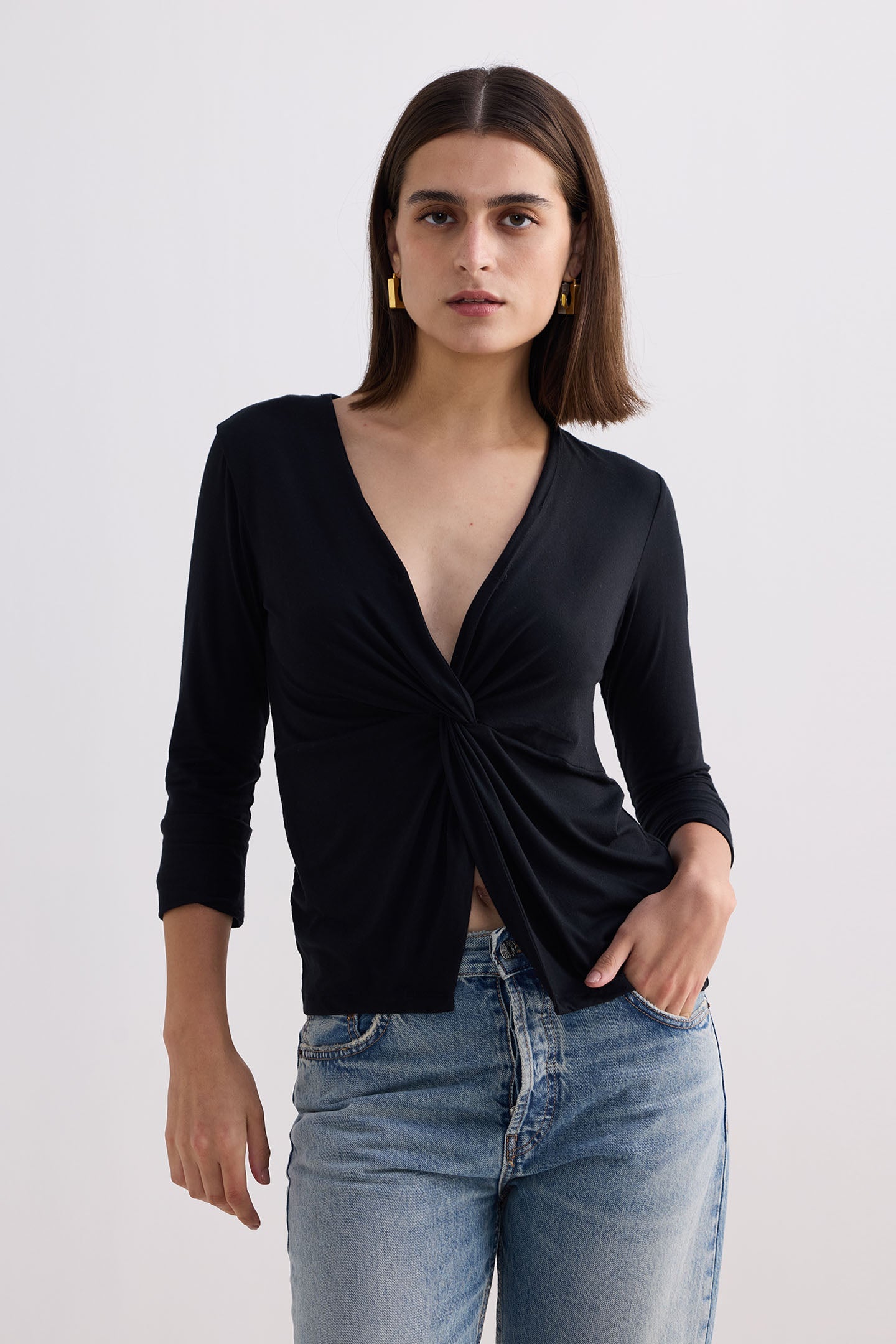 Reistor Twist Front Knit Shirt in Black