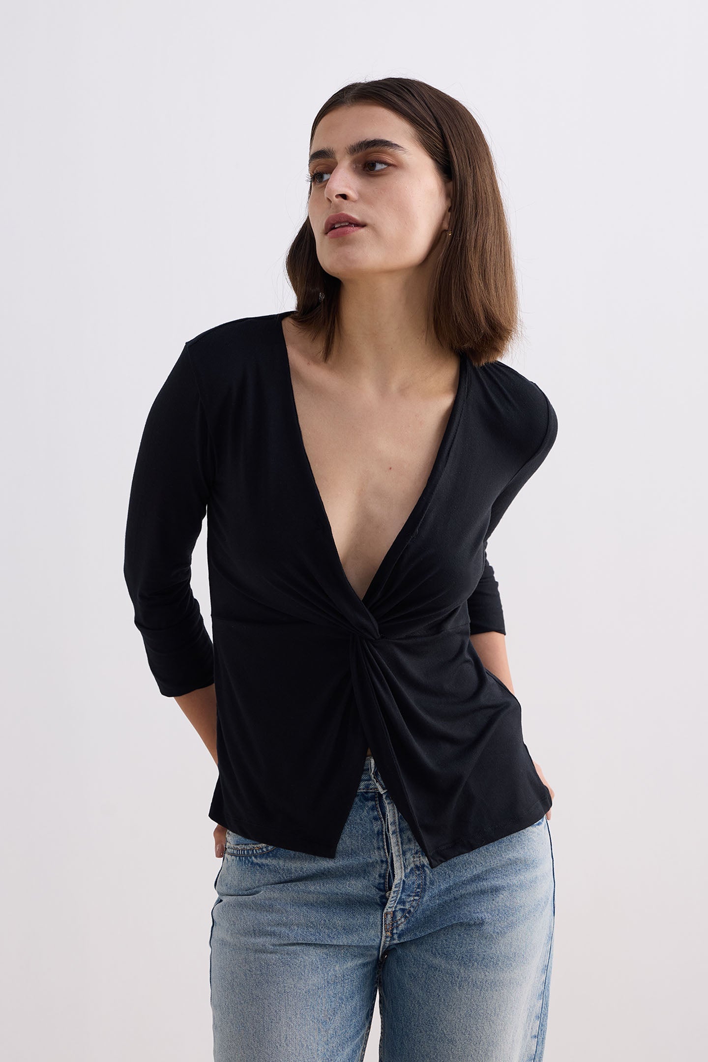 Reistor Twist Front Knit Shirt in Black
