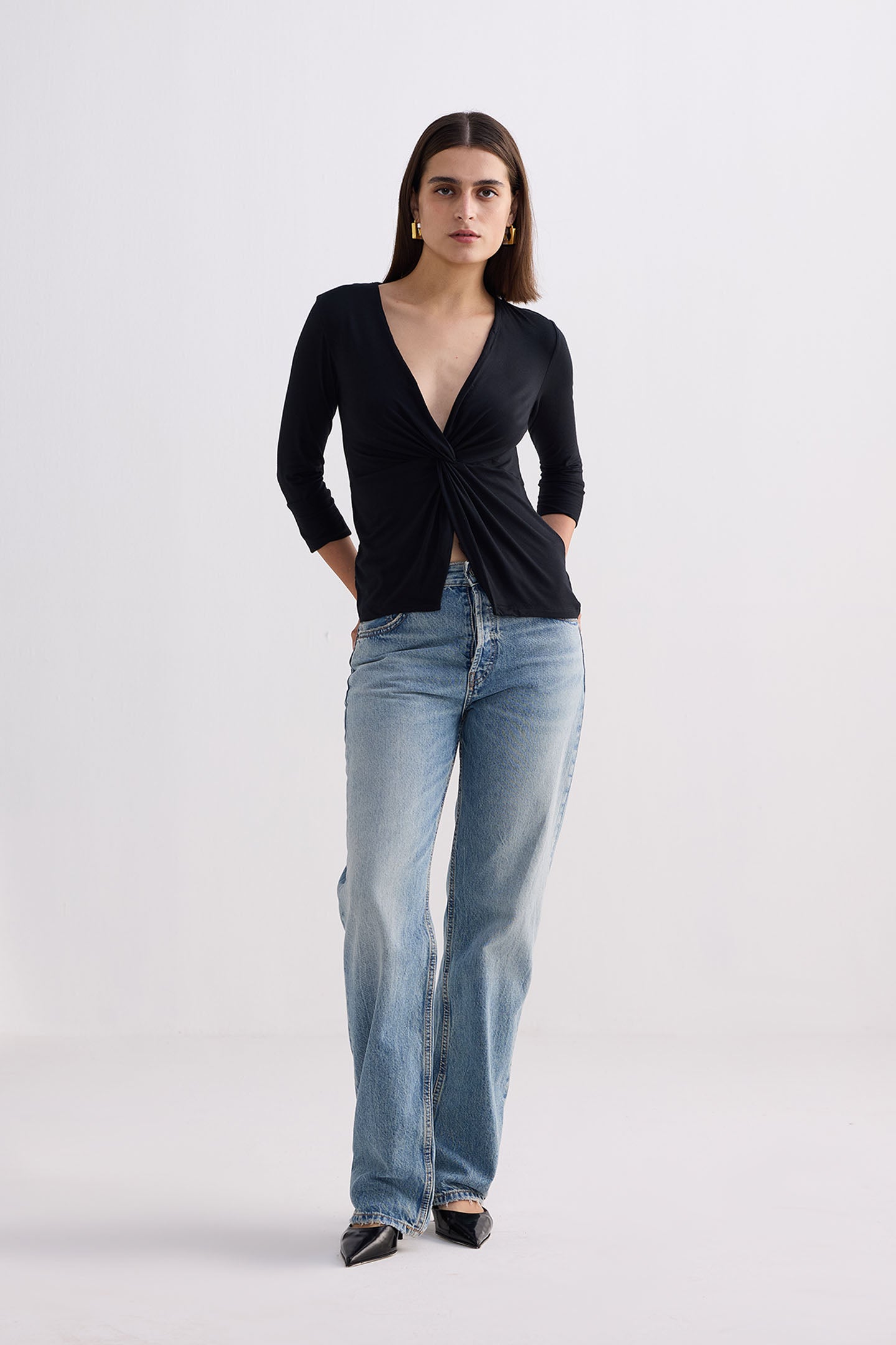 Reistor Twist Front Knit Shirt in Black
