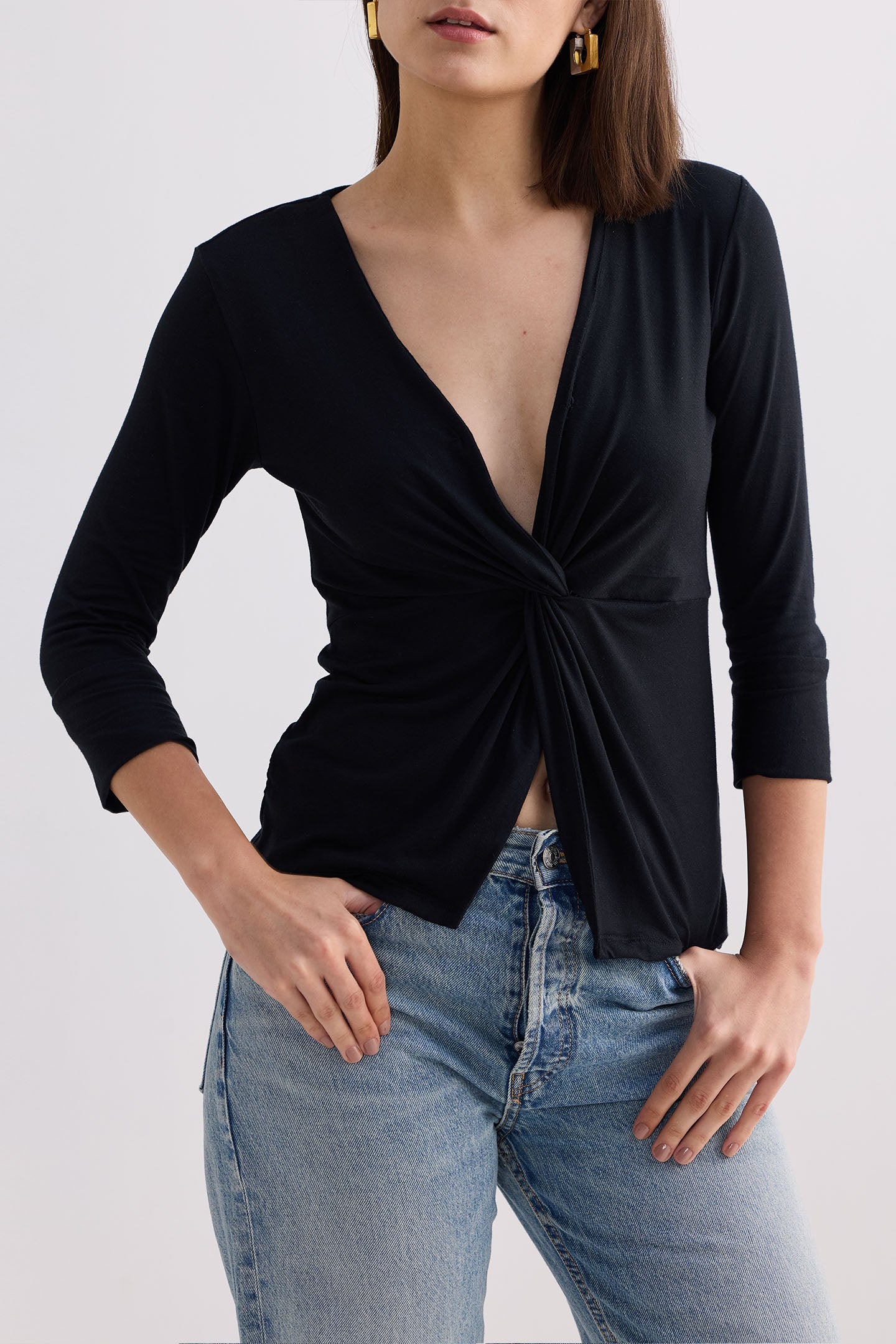 Reistor Twist Front Knit Shirt in Black