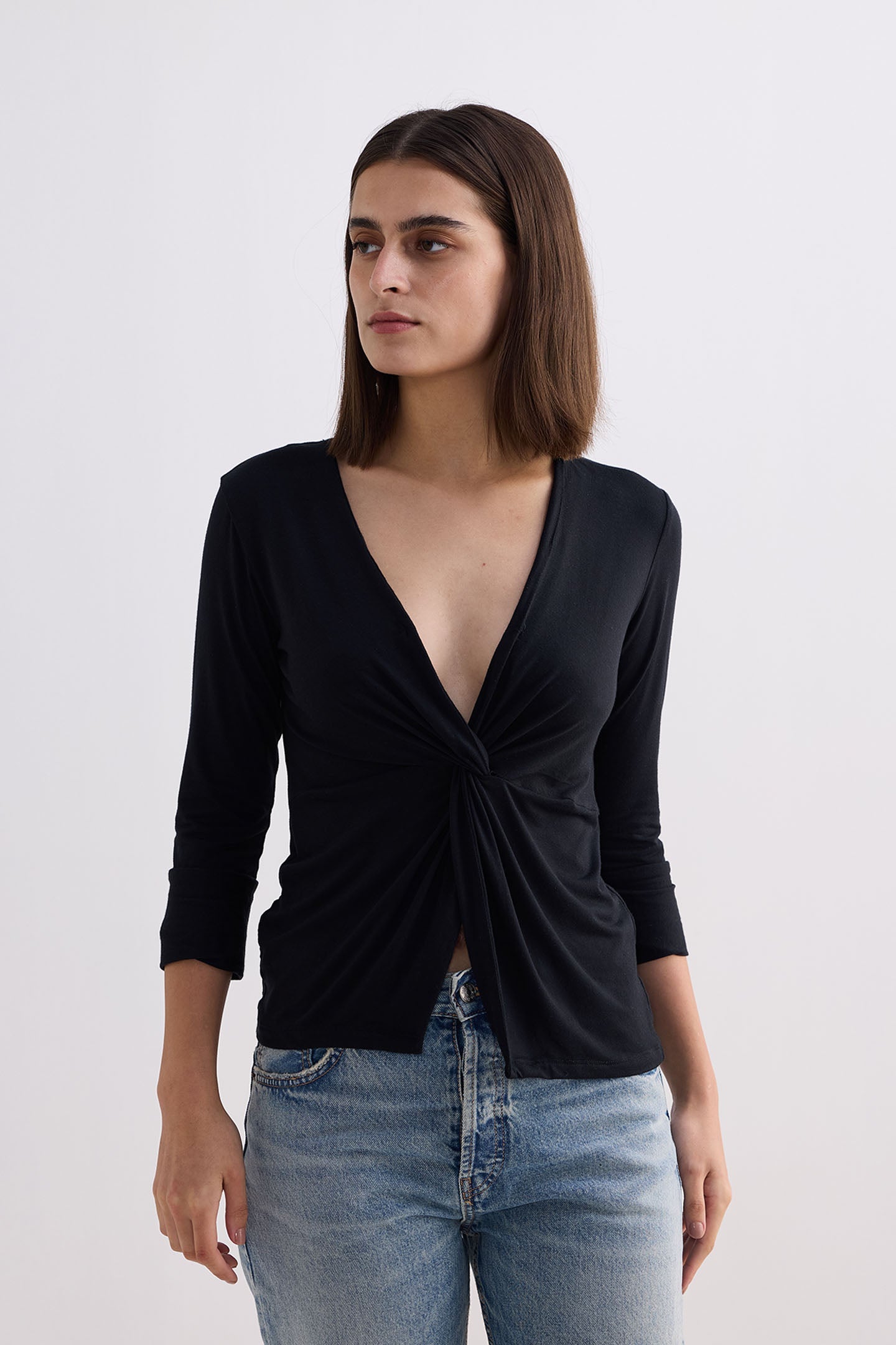Reistor Twist Front Knit Shirt in Black